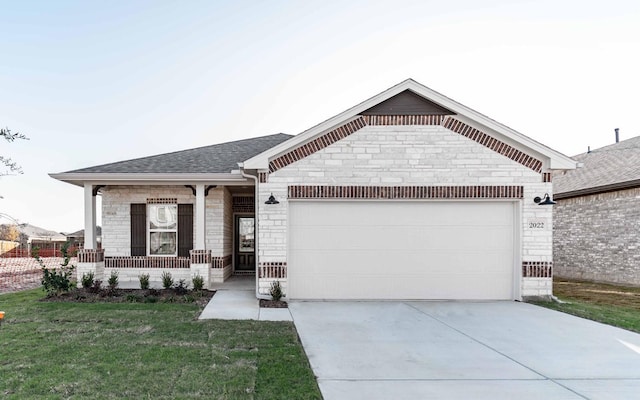 view of front of home featuring a garage, a front yard, and a porch