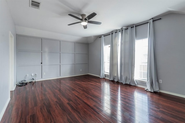 unfurnished room featuring hardwood / wood-style floors, vaulted ceiling, and ceiling fan