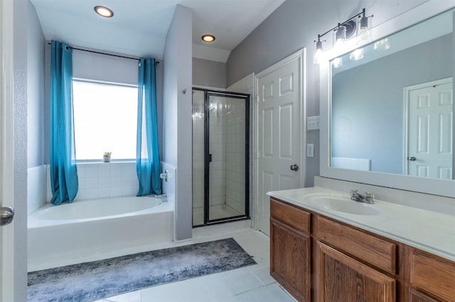 bathroom featuring vanity, tile patterned floors, and independent shower and bath