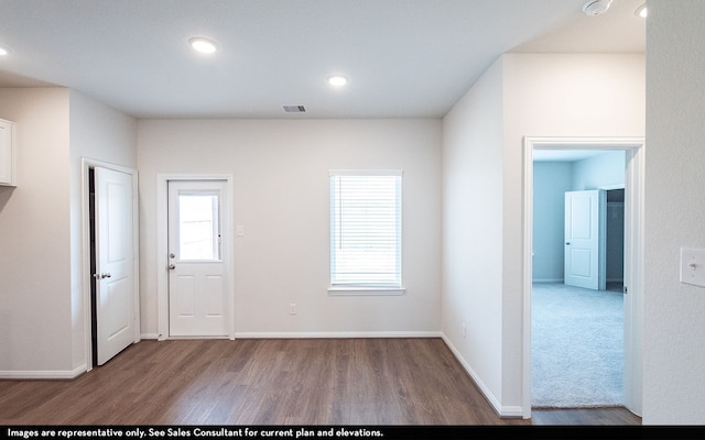 entryway with carpet floors