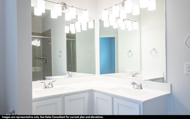 bathroom featuring vanity and an enclosed shower