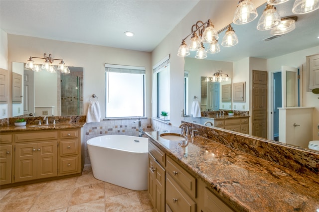 bathroom with vanity and plus walk in shower