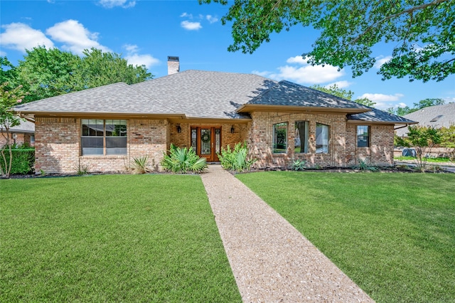 single story home with a front yard