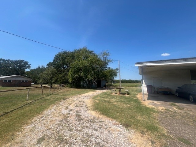 view of yard featuring a carport