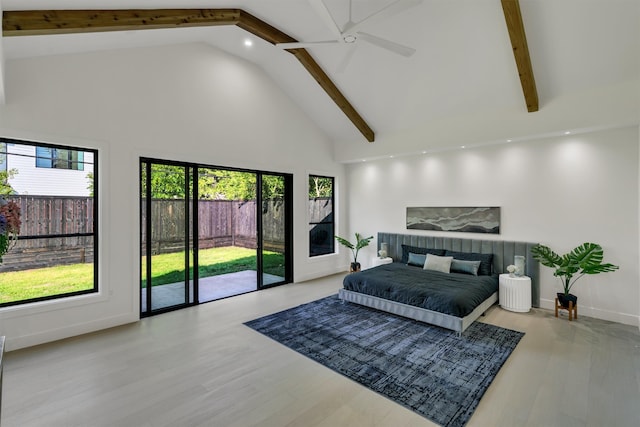 bedroom with high vaulted ceiling, light hardwood / wood-style flooring, access to outside, beam ceiling, and multiple windows