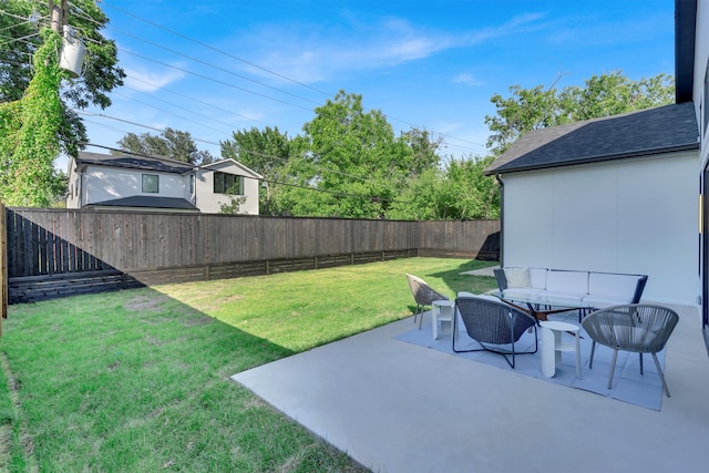 view of yard with outdoor lounge area and a patio