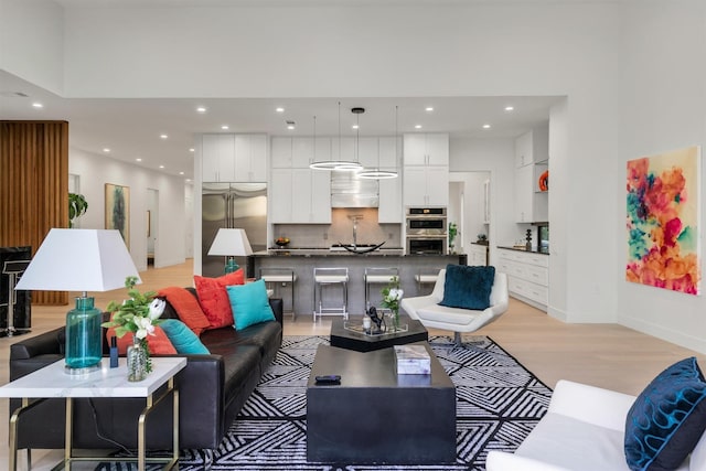 living room with light hardwood / wood-style floors