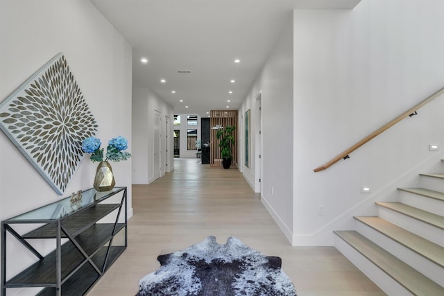 entrance foyer with light wood-type flooring