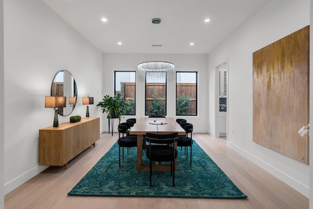 dining room with light hardwood / wood-style flooring