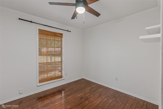 unfurnished room featuring dark wood-type flooring, ceiling fan, and ornamental molding