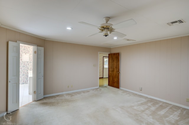 carpeted empty room with ceiling fan and a healthy amount of sunlight