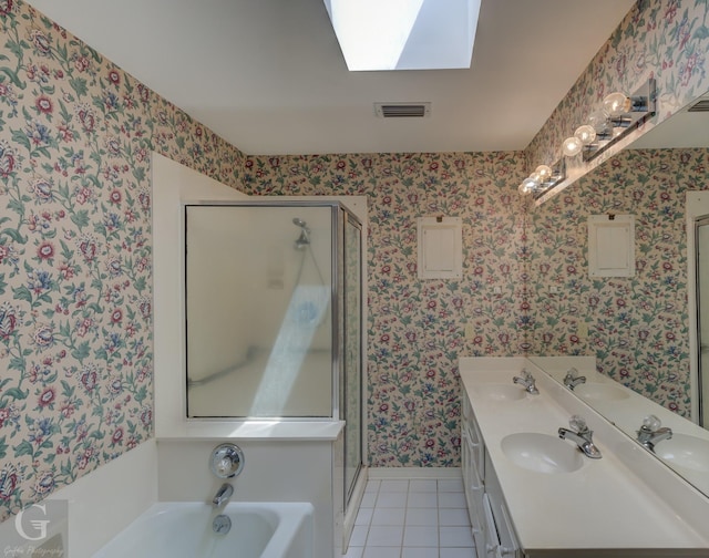 full bathroom with wallpapered walls, visible vents, and a sink