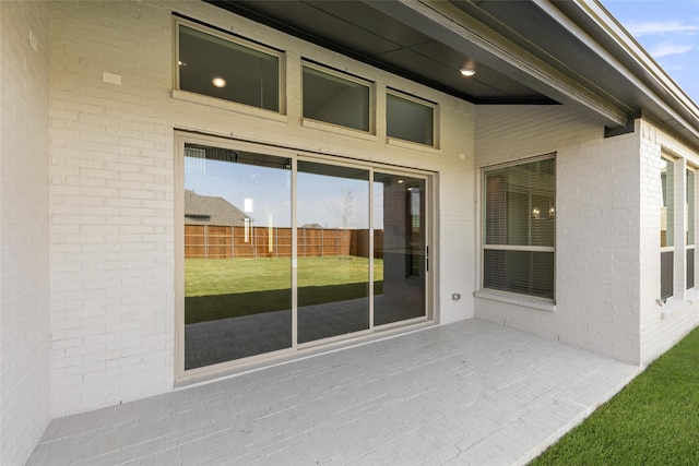 981 Stanford Ln, Prosper, TX 75078 - property entrance featuring a yard, brick siding, and fence