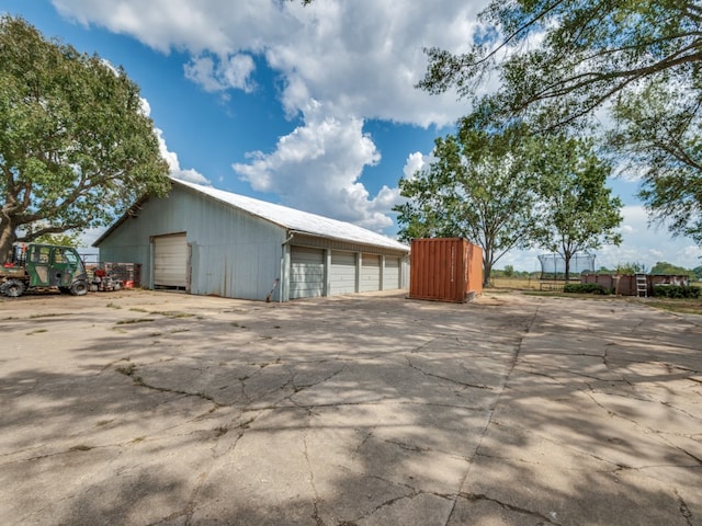 view of outbuilding featuring a garage