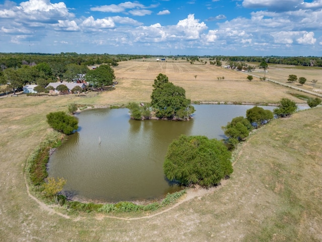 bird's eye view with a water view and a rural view