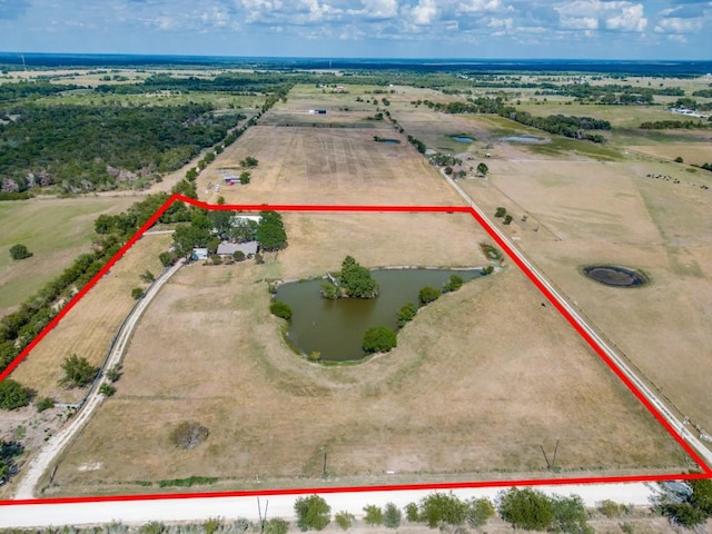 birds eye view of property featuring a rural view