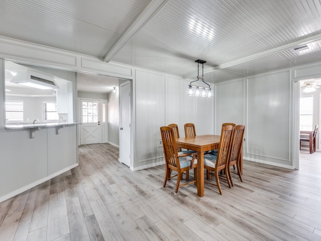 dining room with light hardwood / wood-style floors