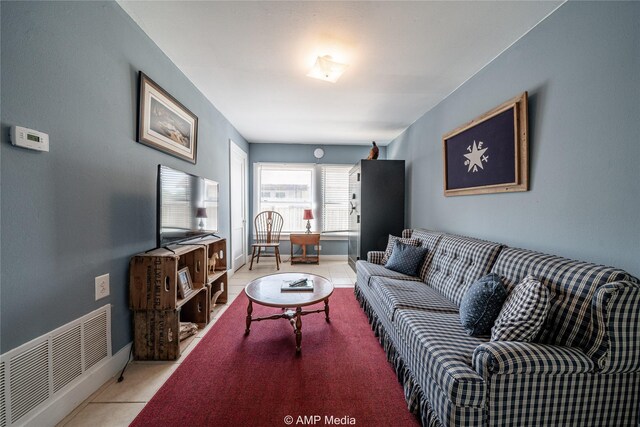 living room with light tile patterned floors