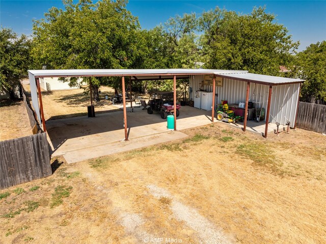 exterior space featuring a carport