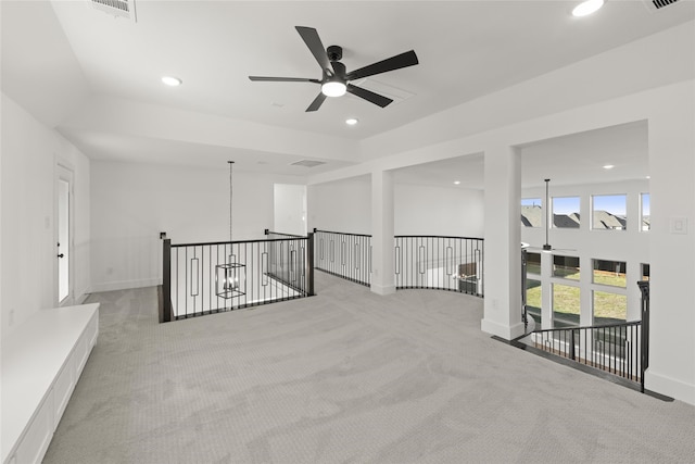 carpeted empty room with ceiling fan