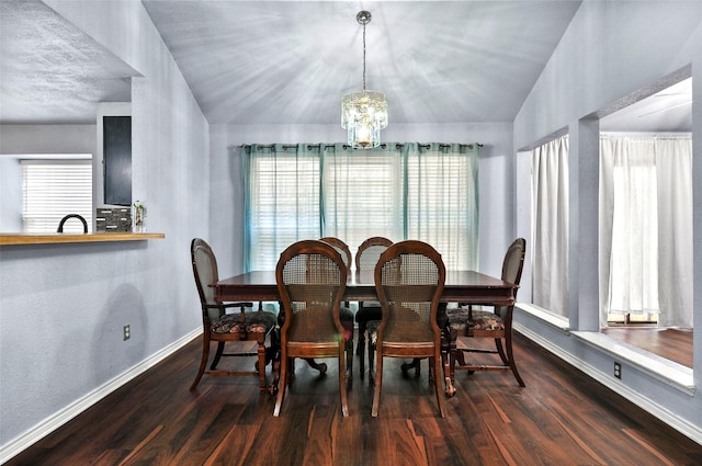 dining area featuring dark wood-style floors, baseboards, vaulted ceiling, and a notable chandelier