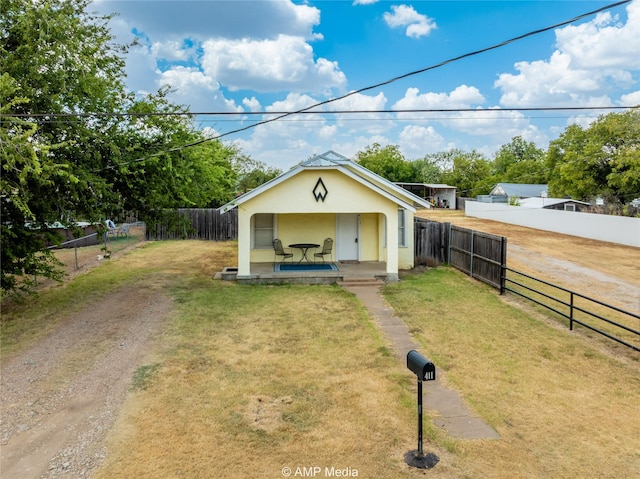 view of outdoor structure with a fenced backyard