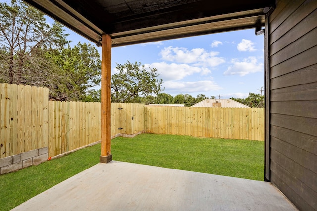 view of yard with a fenced backyard and a patio area