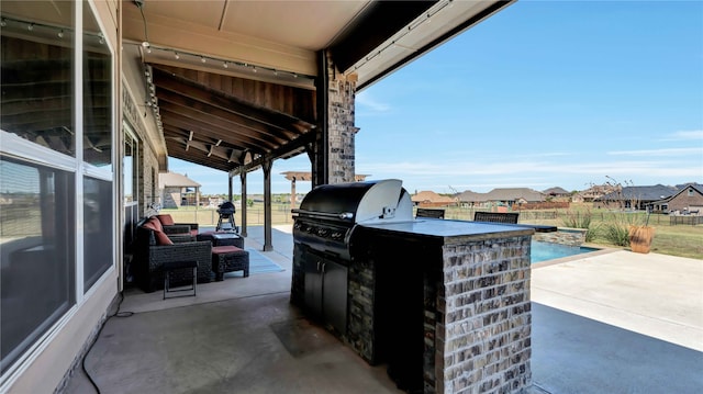 view of patio with area for grilling