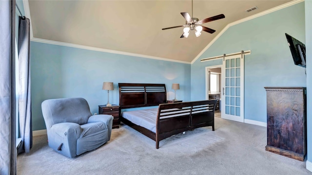 carpeted bedroom with vaulted ceiling, ceiling fan, a barn door, and crown molding