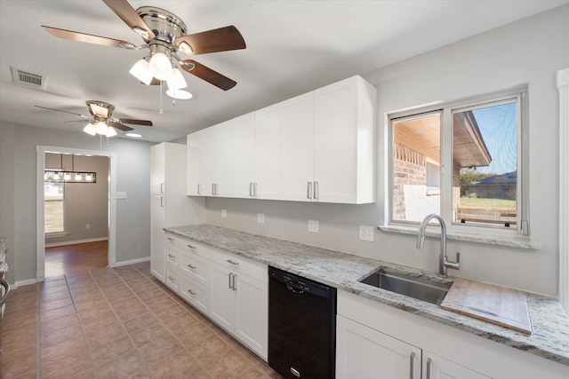 kitchen with white cabinetry, sink, and dishwasher