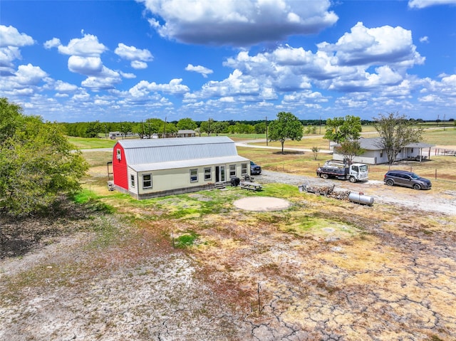 exterior space with a rural view