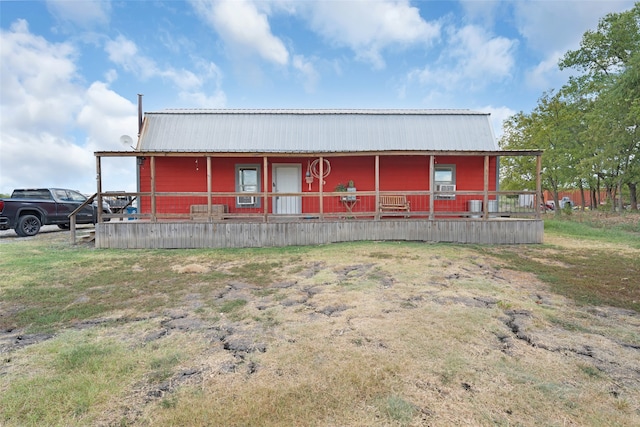 view of outbuilding featuring a porch