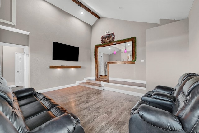 living room featuring high vaulted ceiling, wood-type flooring, and beamed ceiling