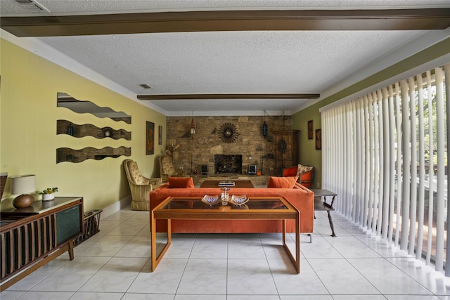 living room with light tile patterned flooring, visible vents, a textured ceiling, and a stone fireplace