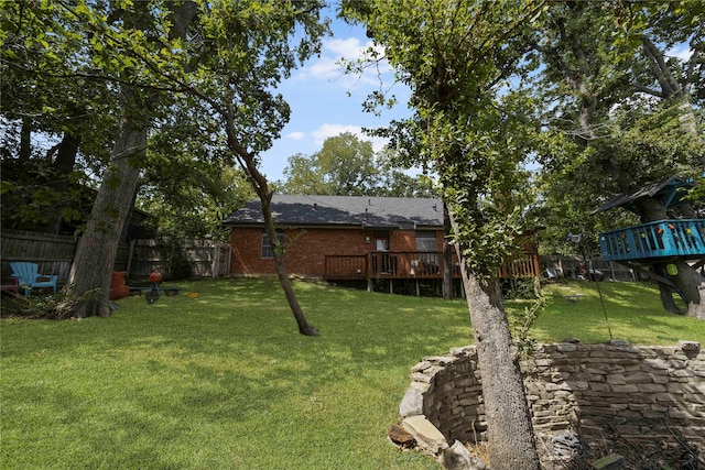 view of yard with a deck