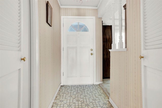 interior space featuring crown molding and light tile patterned flooring