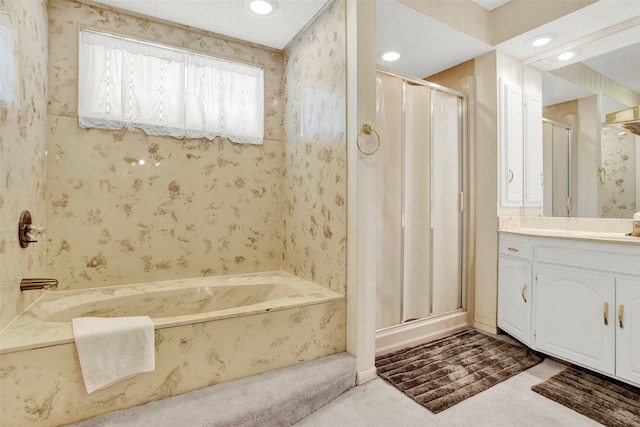 bathroom with vanity and plus walk in shower