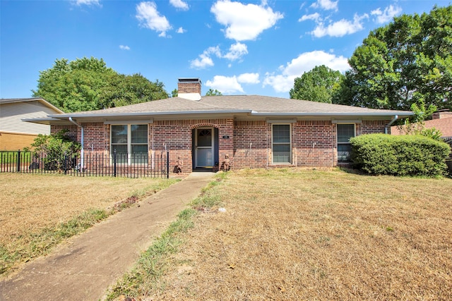 single story home with a front yard