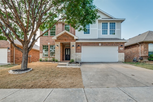 front of property featuring a garage