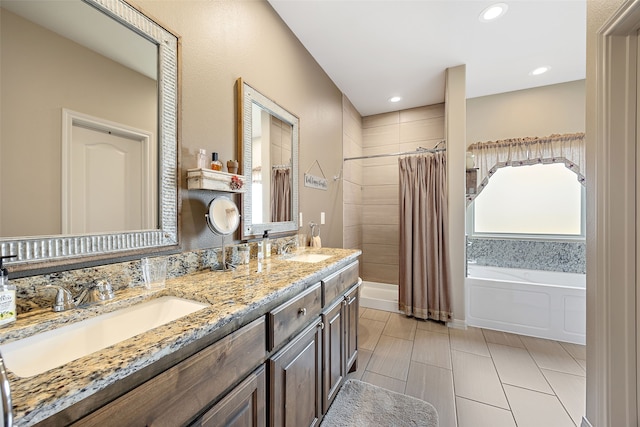 bathroom featuring plus walk in shower, tile patterned flooring, and vanity