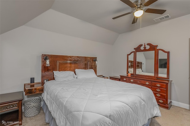 bedroom featuring ceiling fan, light colored carpet, visible vents, baseboards, and vaulted ceiling