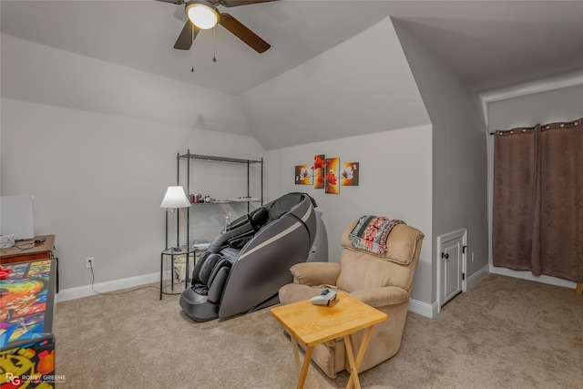 sitting room with carpet floors, baseboards, a ceiling fan, and lofted ceiling