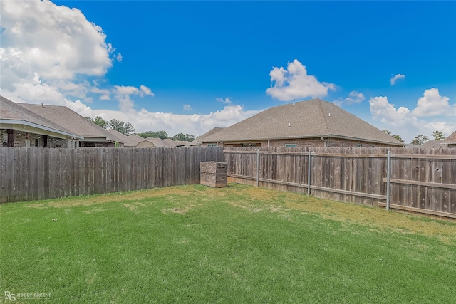 view of yard featuring a fenced backyard