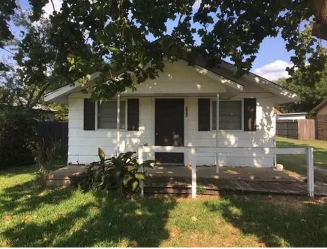 bungalow with a front lawn