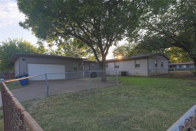 exterior space featuring a garage and central AC unit