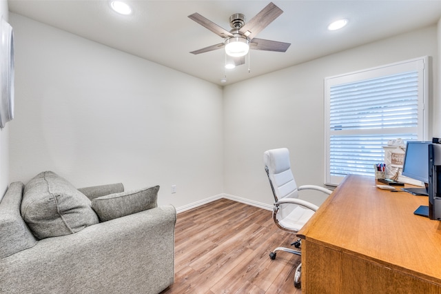 home office featuring ceiling fan and hardwood / wood-style floors