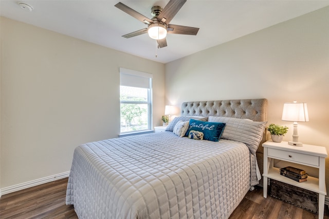 bedroom featuring ceiling fan and dark hardwood / wood-style flooring