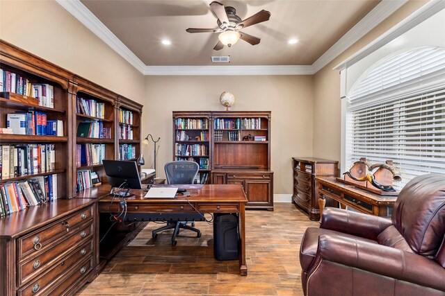 office area featuring crown molding, ceiling fan, and wood-type flooring