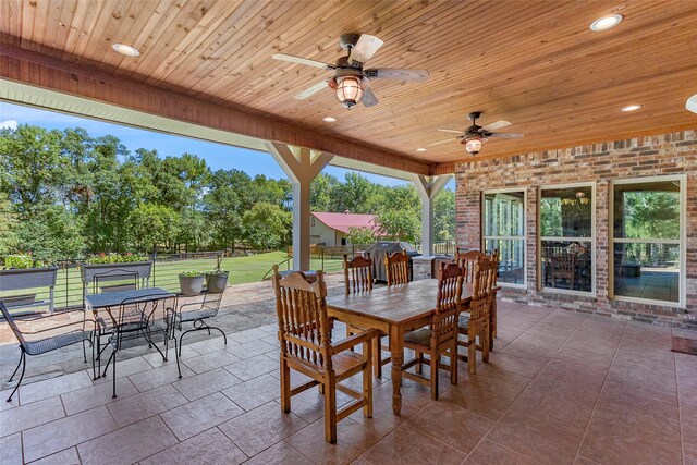 view of patio / terrace featuring ceiling fan