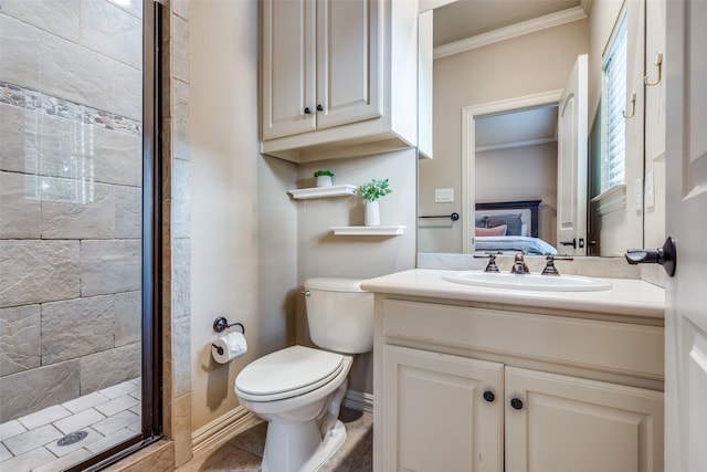 bathroom with vanity, a shower, crown molding, and toilet